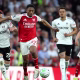 Myles-lewis-skelly-of-arsenal-battles-for-possession-with-sasa-lukic-of-fulham
