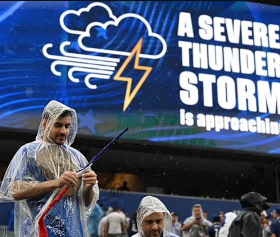 A downpour and thunderstorm caused a delay in Monday's World Cup game between France and Iraq.