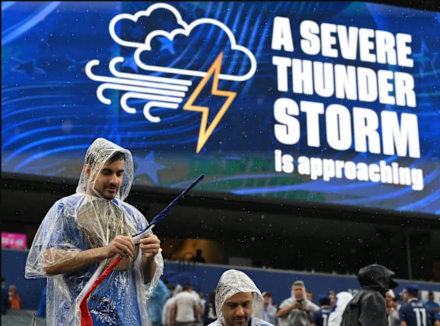 A downpour and thunderstorm caused a delay in Monday's World Cup game between France and Iraq.